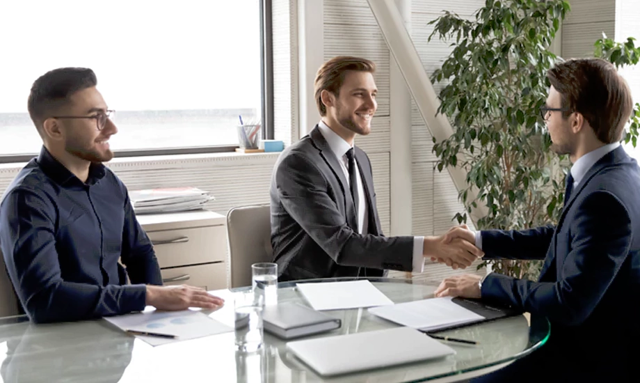 Lawyer hand shake with client